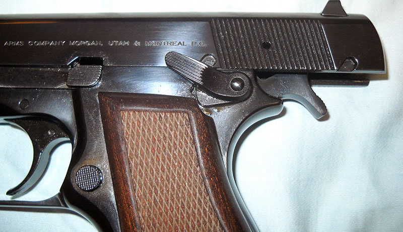 detail, Browning Hi-Power left side safety lever doubling as slide lock